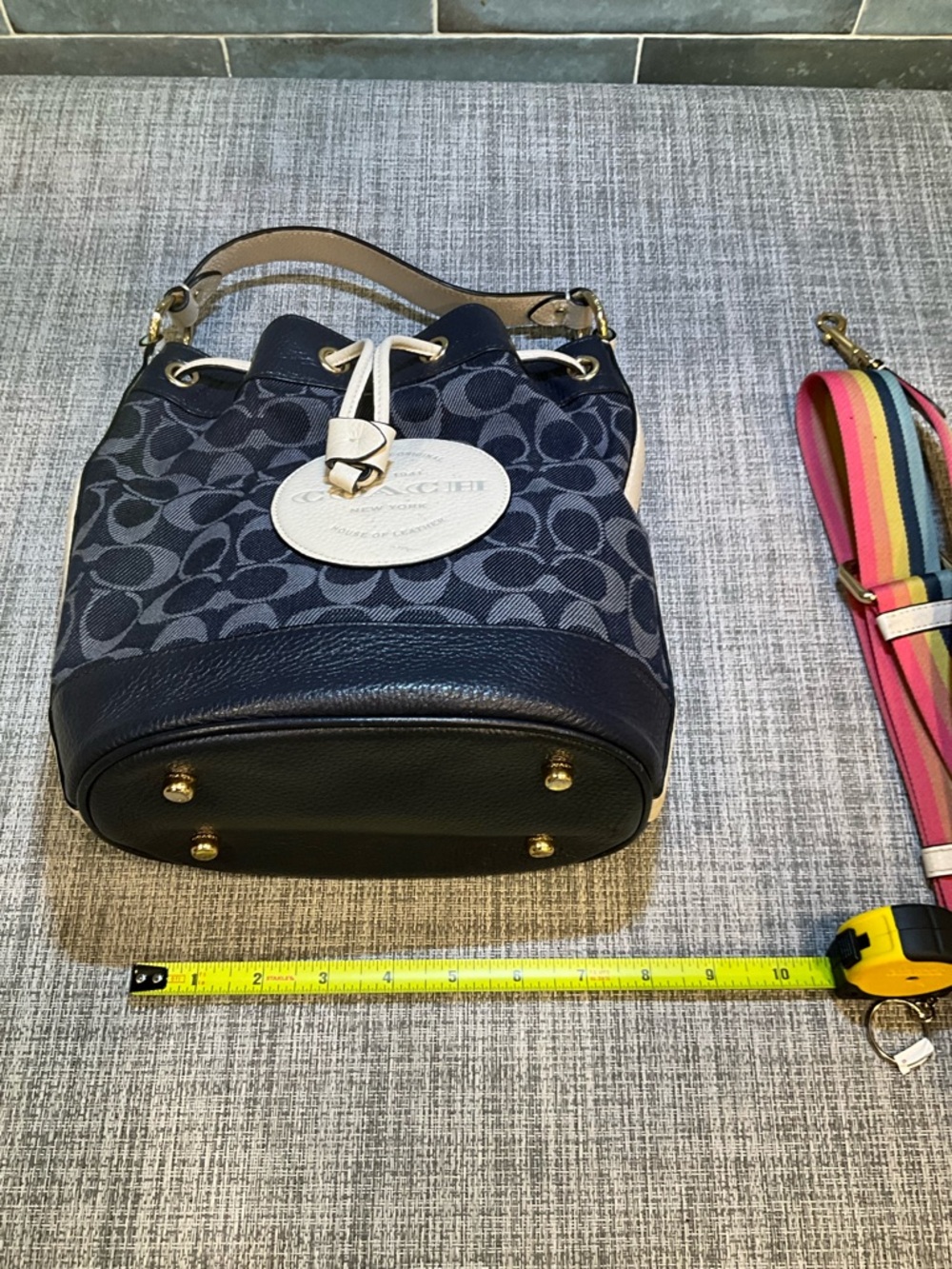 Coach Dempsey Navy Signature Bucket Bag with Tan Accents and Rainbow Strap - Picture 9 of 12